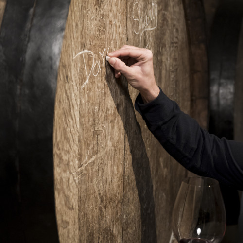 man-writing-barrel-side-view
			                