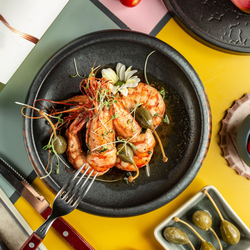 top-view-grilled-prawns-garnished-with-pickles-flowers
                                        