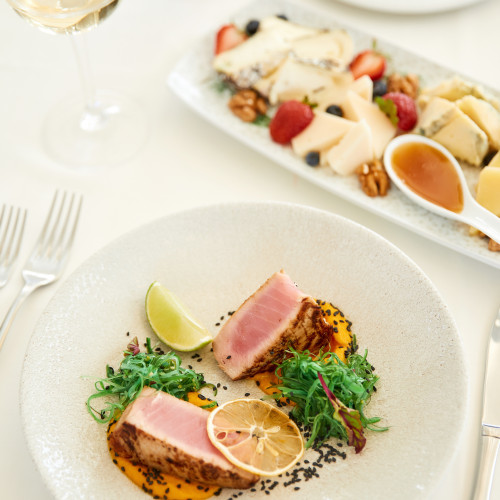 vertical-view-delicious-tuna-dish-with-glass-wine-cheese-set
                                        