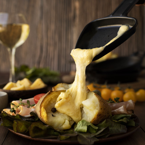 raclette-dish-with-assortment-delicious-food
			                